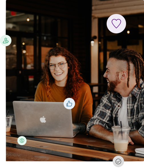 Man and woman working on a laptop