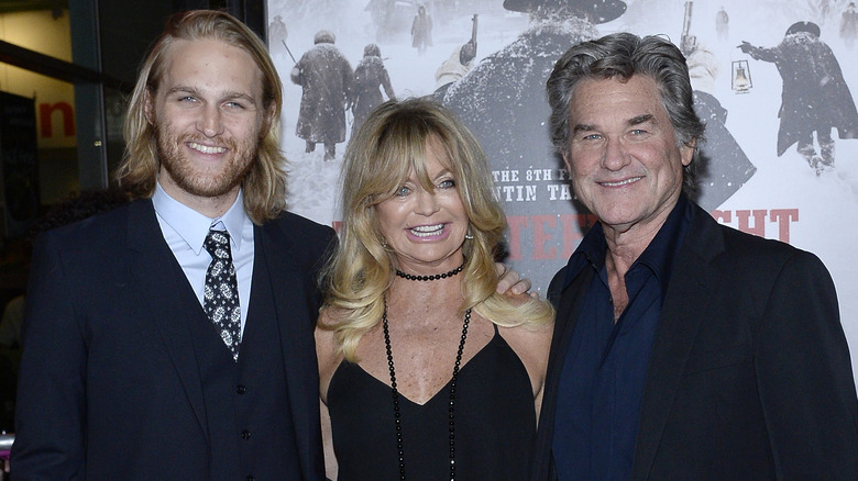 Wyatt Russell, Goldie Hawn, and Kurt Russell smiling for a photo