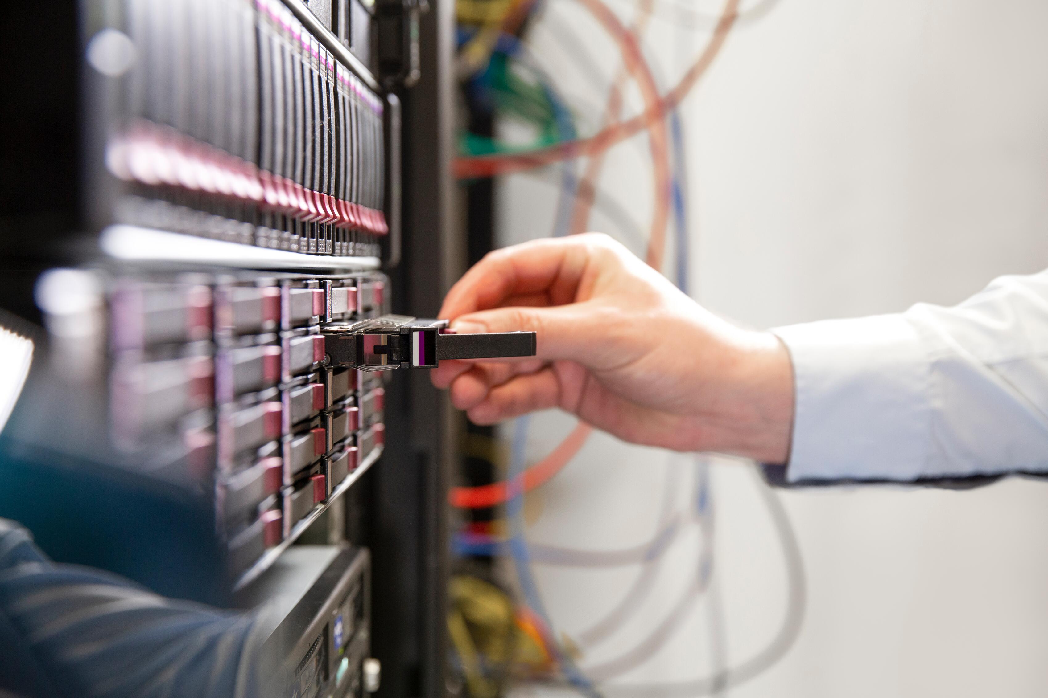 A hand showing plugging in a socket