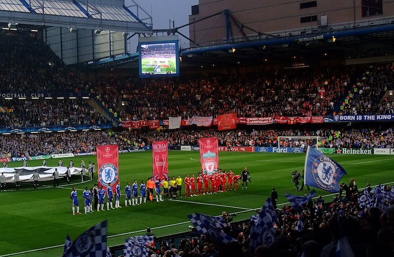 London Football: View from the West Stand of Stamford Bridge during a Champions League game. Photo Credit: © Brian Minkoff via WikiMedia Commons. 