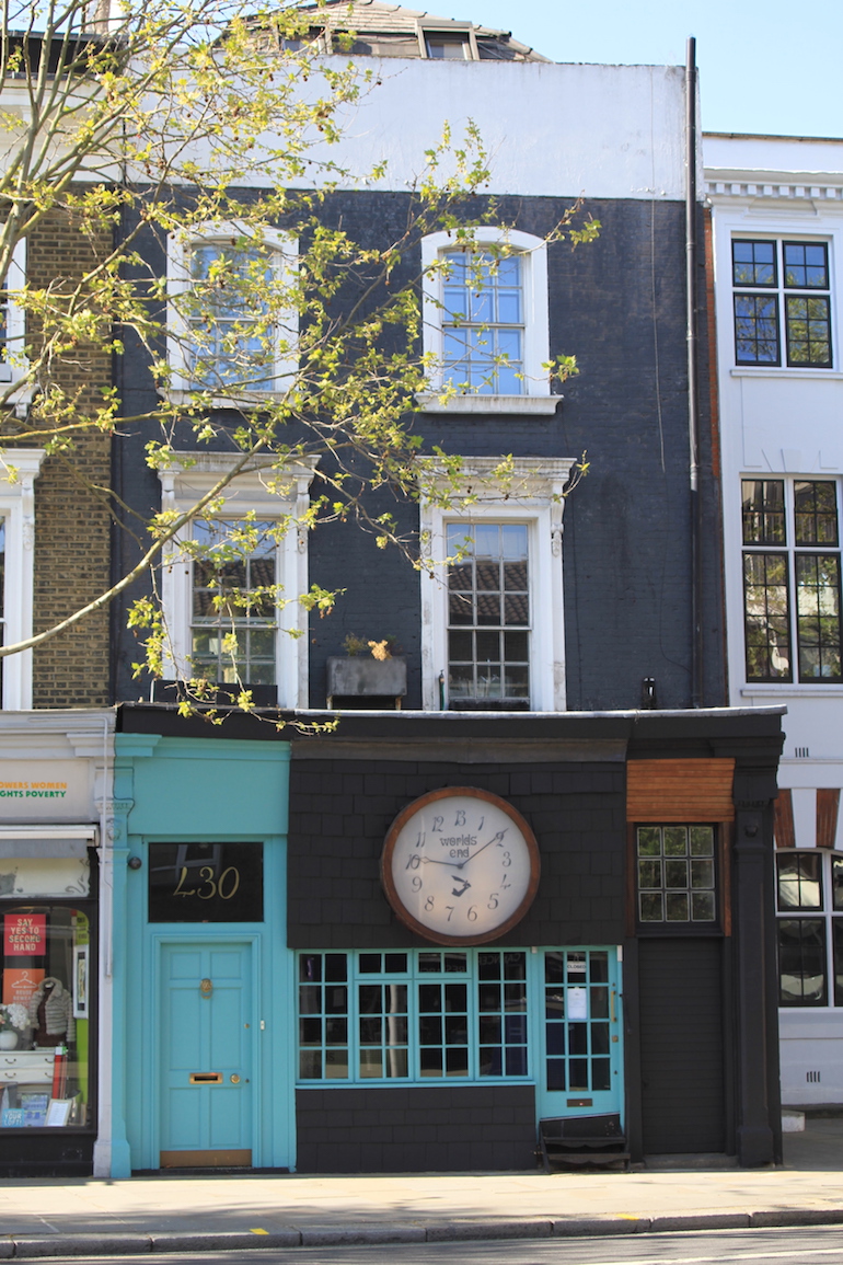 The World’s End shop showing its famous clock with backward spinning hands. Photo Credit: © Clare McCoy.