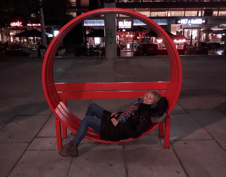 Gail Jones on a Jeppe Hein modified bench on the Southbank. Photo Credit: © Gail Jones. 