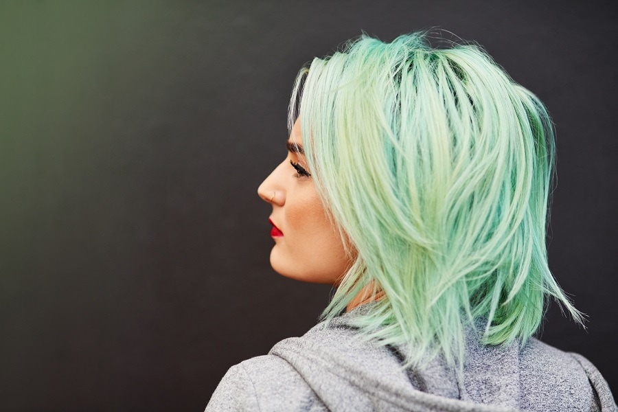 medium choppy bob with mint green hair