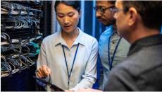 Workers in a server room