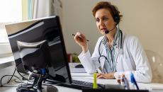 A doctor in a virtual call with a patient