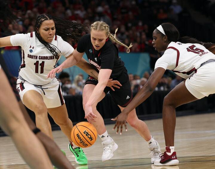 Louisville guard Hailey Van Lith found little room between South Carolinas Destiny Littleton (11) and Laeticia Amihere. (Carlos Gonzalez / Star Tribune)