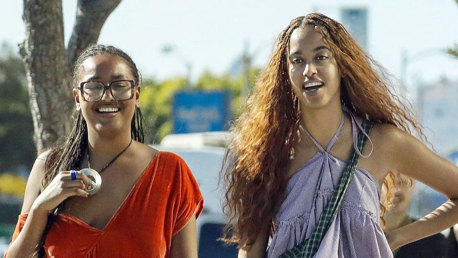 Sasha and Malia Obama enjoy their sisterly bond as they have lunch with friends