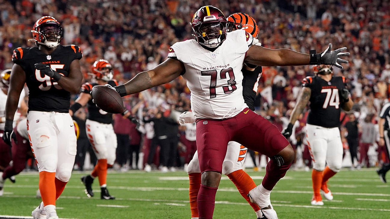 Trent Scott 73 of the Washington Commanders celebrates after scoring a touchdown against the Cincinnati Bengals during the third quarter at Paycor Stadium on September 23, 2024 in Cincinnati, Ohio.