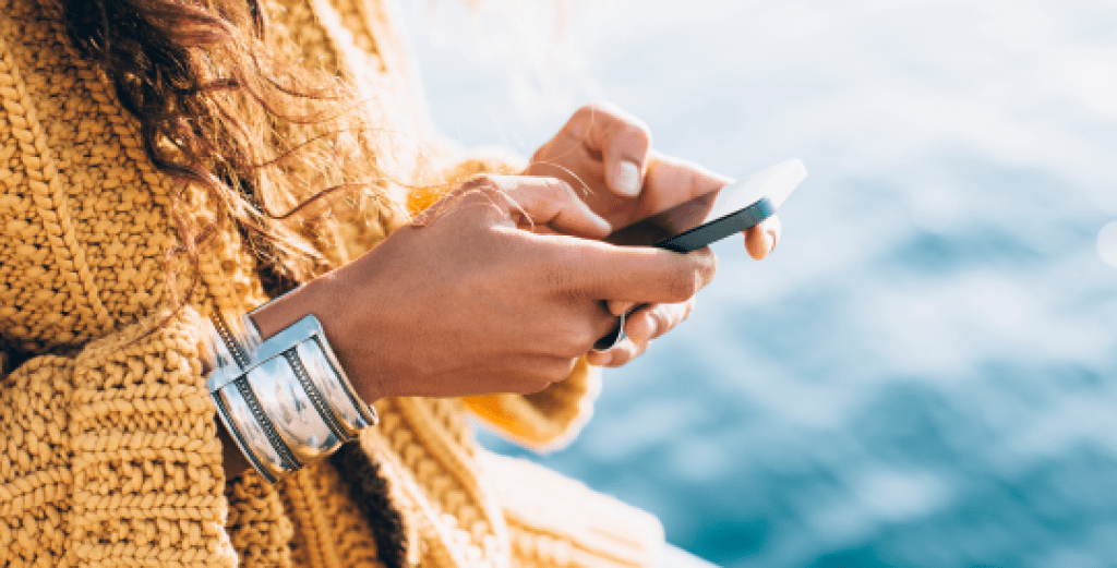 Woman texting on her mobile phone