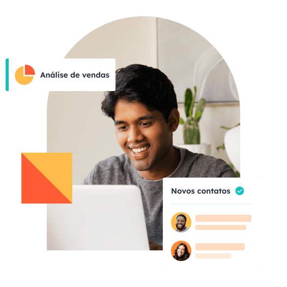 Usuário da HubSpot visualizando análises de vendas e novos contatos gerados em sua conta da HubSpot