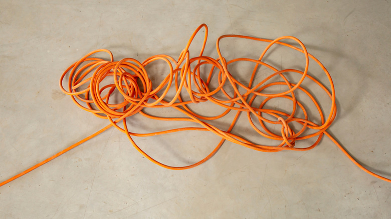 tangled orange extension cord