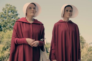 THE HANDMAID'S TALE, (from left): Elisabeth Moss, Alexis Bledel, 'Offred', (Season 1, ep. 101, aired April 26, 2017). photo: George Kraychyk / ©Hulu / Courtesy: Everett Collection