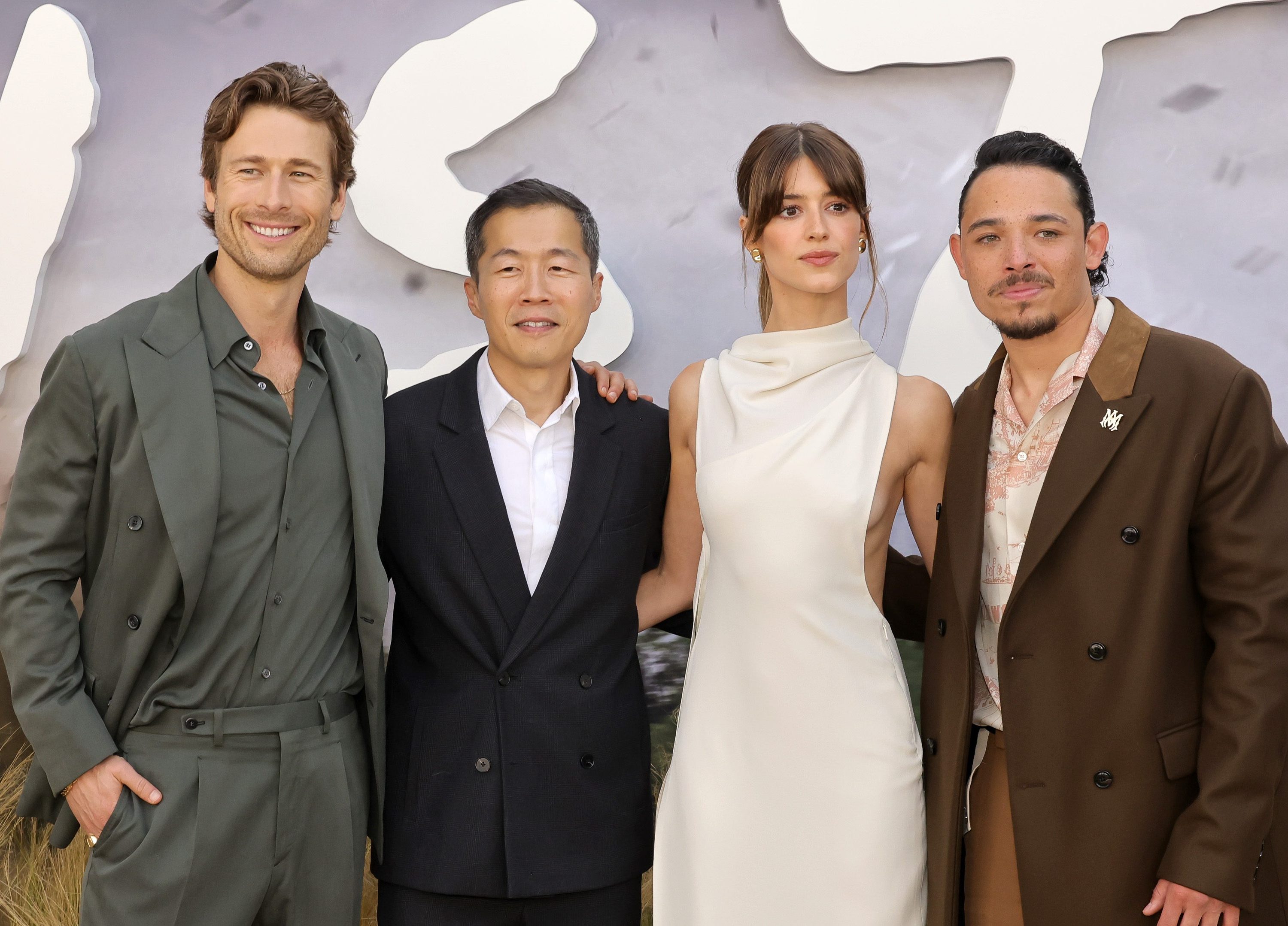 LOS ANGELES, CALIFORNIA - JULY 11: (L-R) Glen Powell, Lee Isaac Chung, Daisy Edgar-Jones, and Anthony Ramos attend the premiere of Universal Pictures' "Twisters" on July 11, 2024 in Los Angeles, California. (Photo by Kevin Winter/Getty Images)