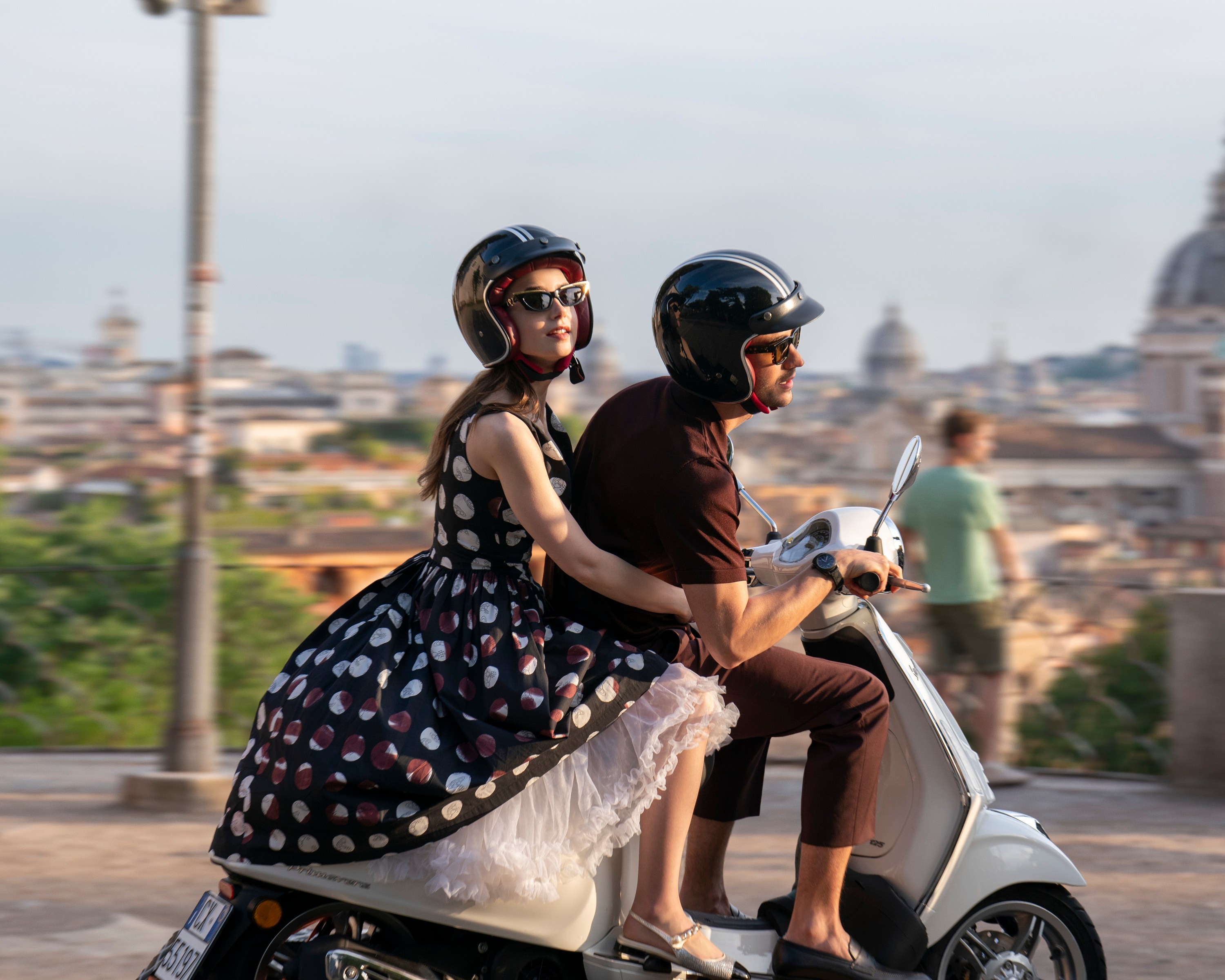 Emily in Paris. (L to R) Lily Collins as Emily, Eugenio Franceschini as Marcello in Emily in Paris. Cr. Giulia Parmigiani/Netflix © 2024