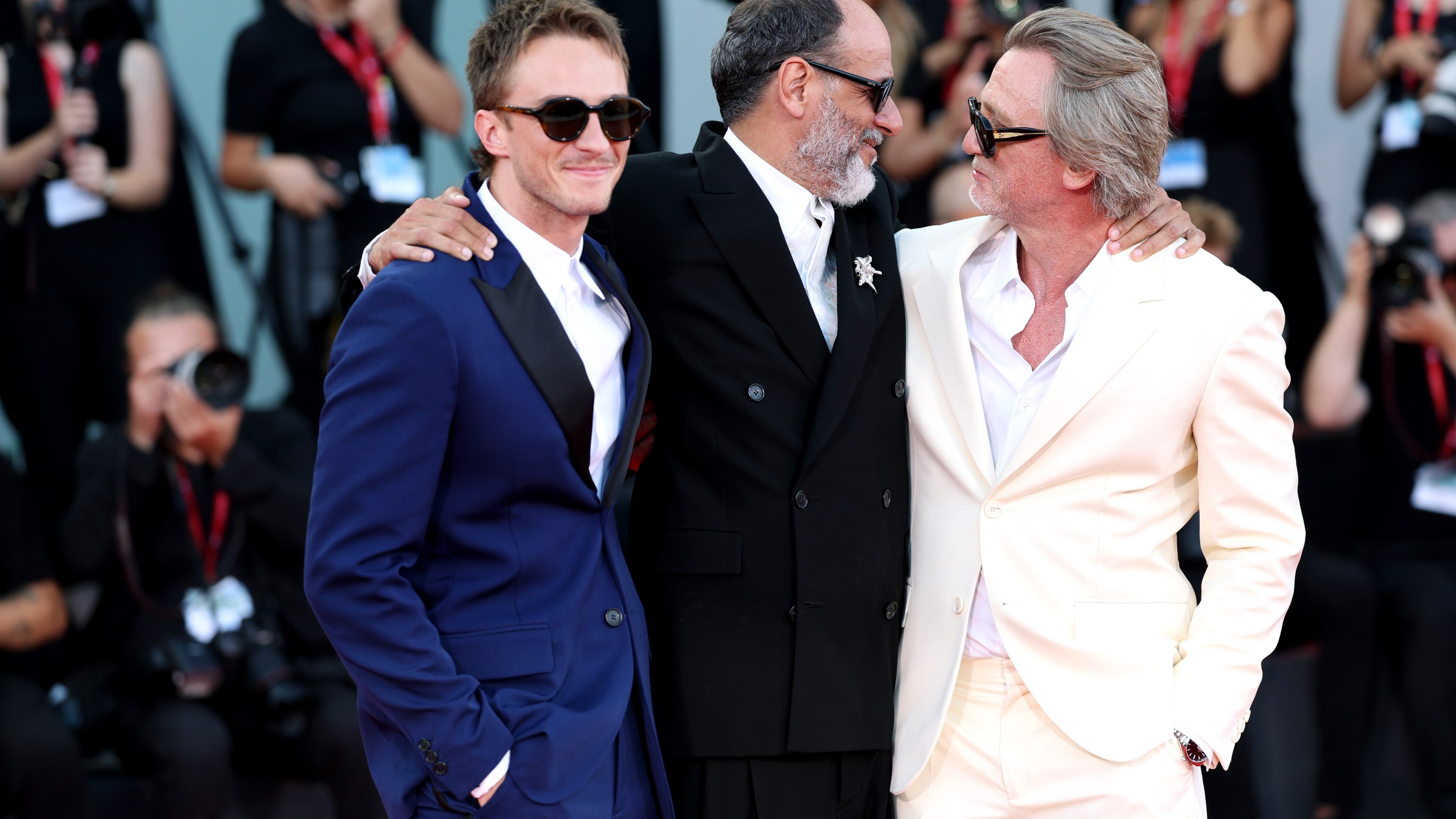 Drew Starkey, director Luca Guadagnino and Daniel Craig attend the 'Queer' red carpet during the 81st Venice International Film Festival.