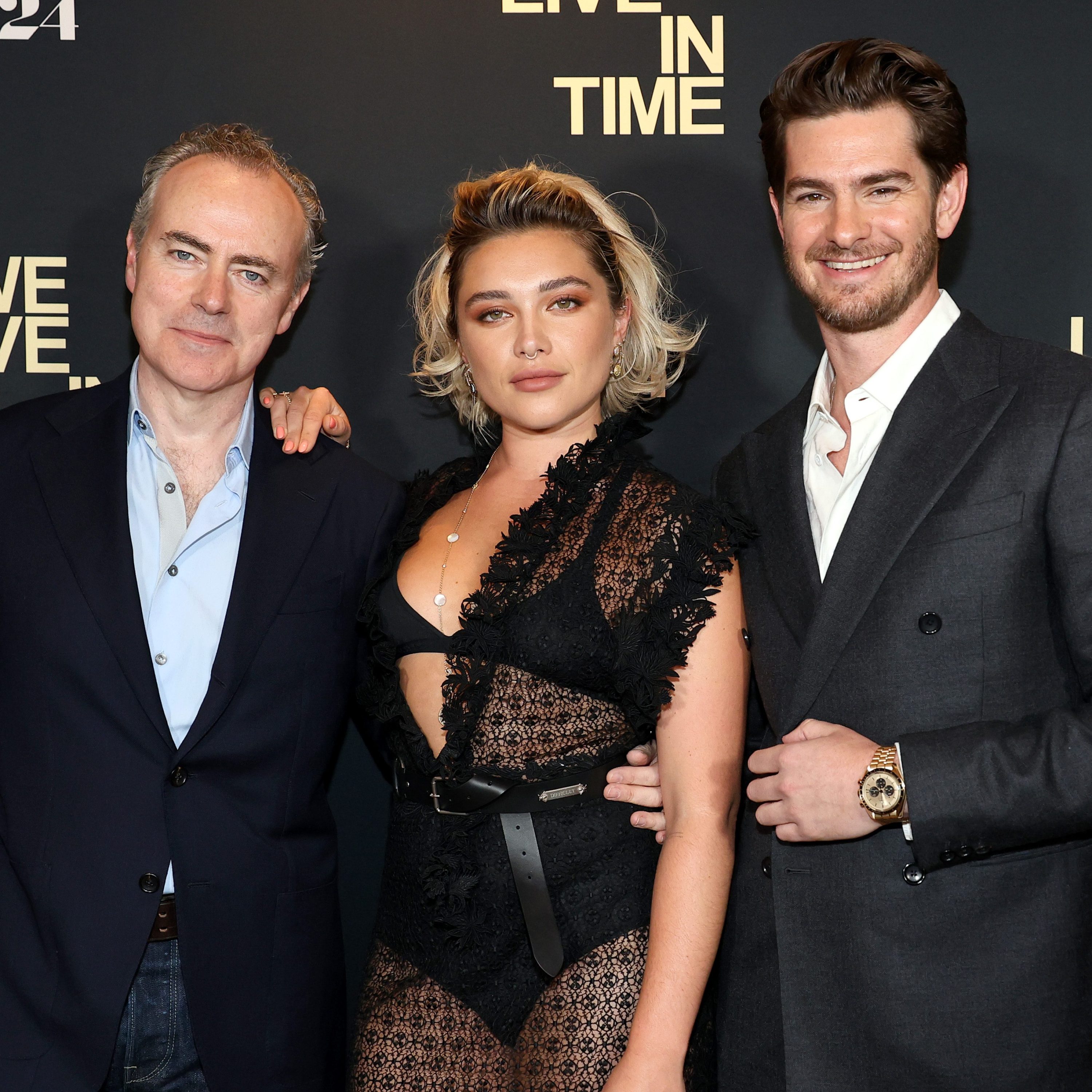 NEW YORK, NEW YORK - SEPTEMBER 09: (L-R) John Crowley, Florence Pugh and Andrew Garfield attend A24's "We Live in Time" New York Screening at Crosby Street Hotel on September 09, 2024 in New York City. (Photo by Marleen Moise/Getty Images)