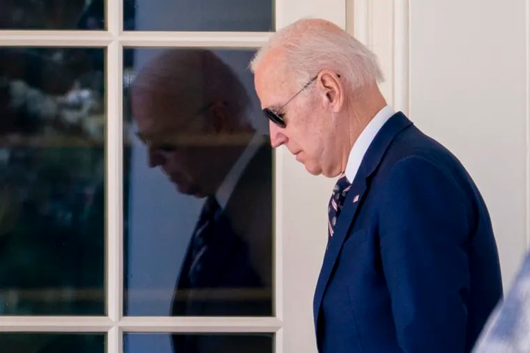 President Joe Biden walks out of the Oval Office in March.