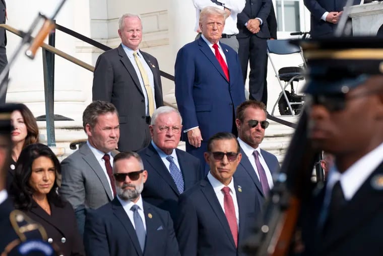 Former President and Republican presidential nominee Donald Trump watches the changing of the guard at the Tomb of the Unknown Solider at Arlington National Cemetery, Monday, Aug. 26, 2024.