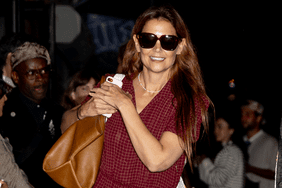 Katie Holmes wears jumpsuit with sunglasses