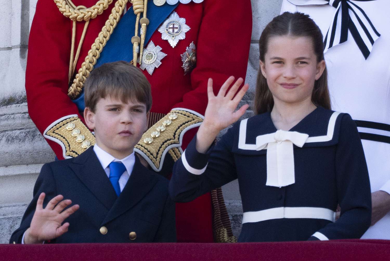 Prince Louis and Princess Charlotte bickered and argued at trooping the colour.