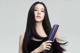 Woman Using Dyson Hair Tool