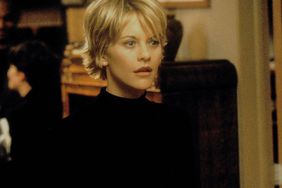 Meg Ryan wearing a black belted dress in You've Got Mail