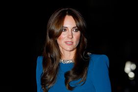 Kate Middleton in teal blue dress 