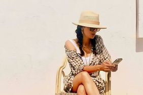 Salma Hayke wearing white tank top with gingham shirt and tan wide brimmed hat