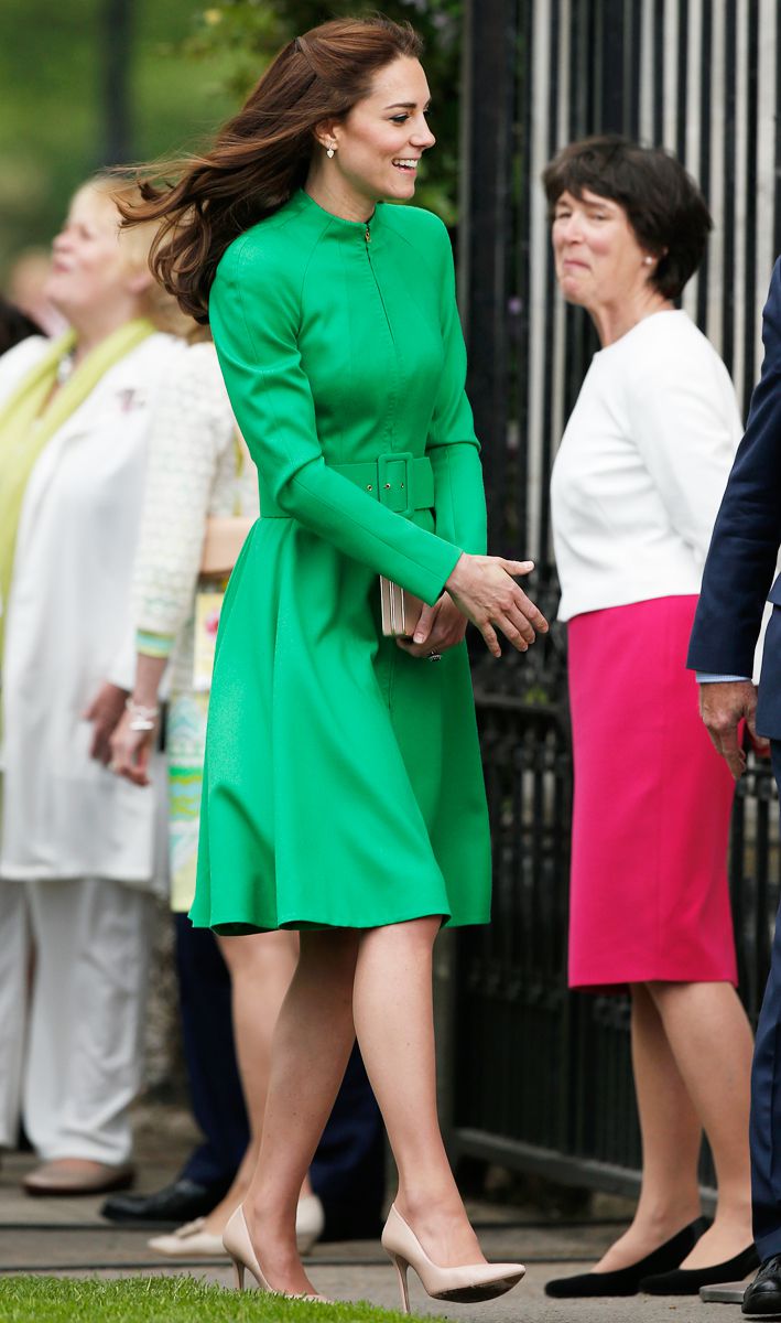 Kate Middleton in a belted emerald green dress