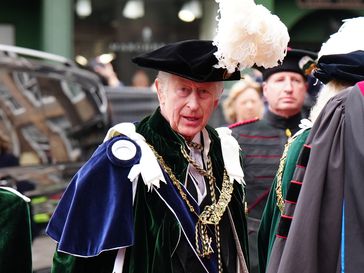 King Charles in a uniform and feather hat