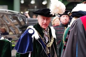 King Charles in a uniform and feather hat