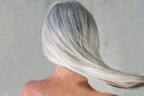 Back of woman's head with grey hair