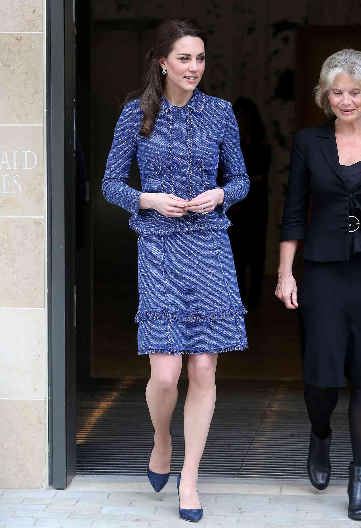 Kate Middleton in a blue Rebecca Taylor skirt suit