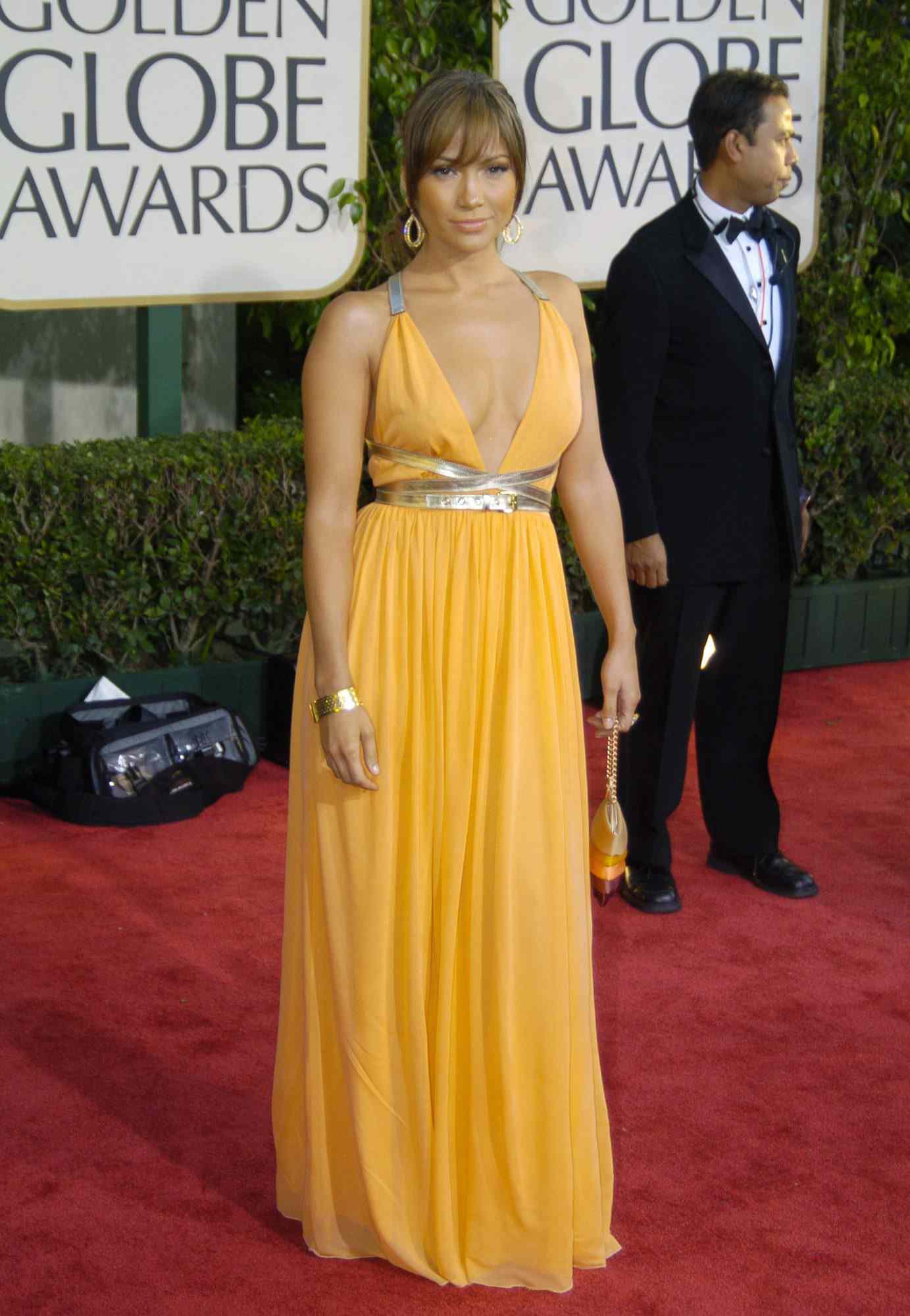 Jennifer Lopez in a yellow Michael Kors gown at the 2004 Golden Globe Awards