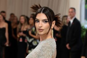 Emily Ratajkowski wearing a striking up-do.