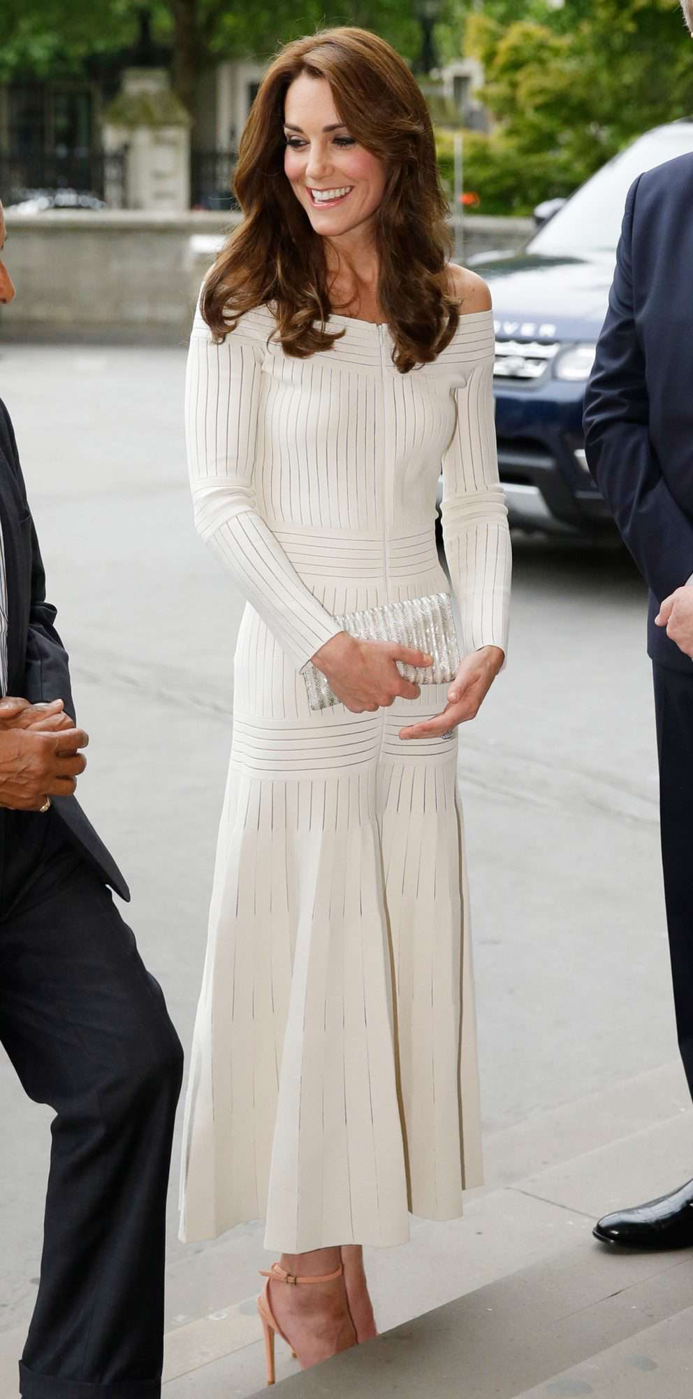 Kate Middleton in a white off-the-shoulder Barbara Casasola dress