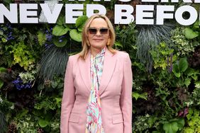 Kim Cattrall in pink suit with multi-colored-floral blouse underneath