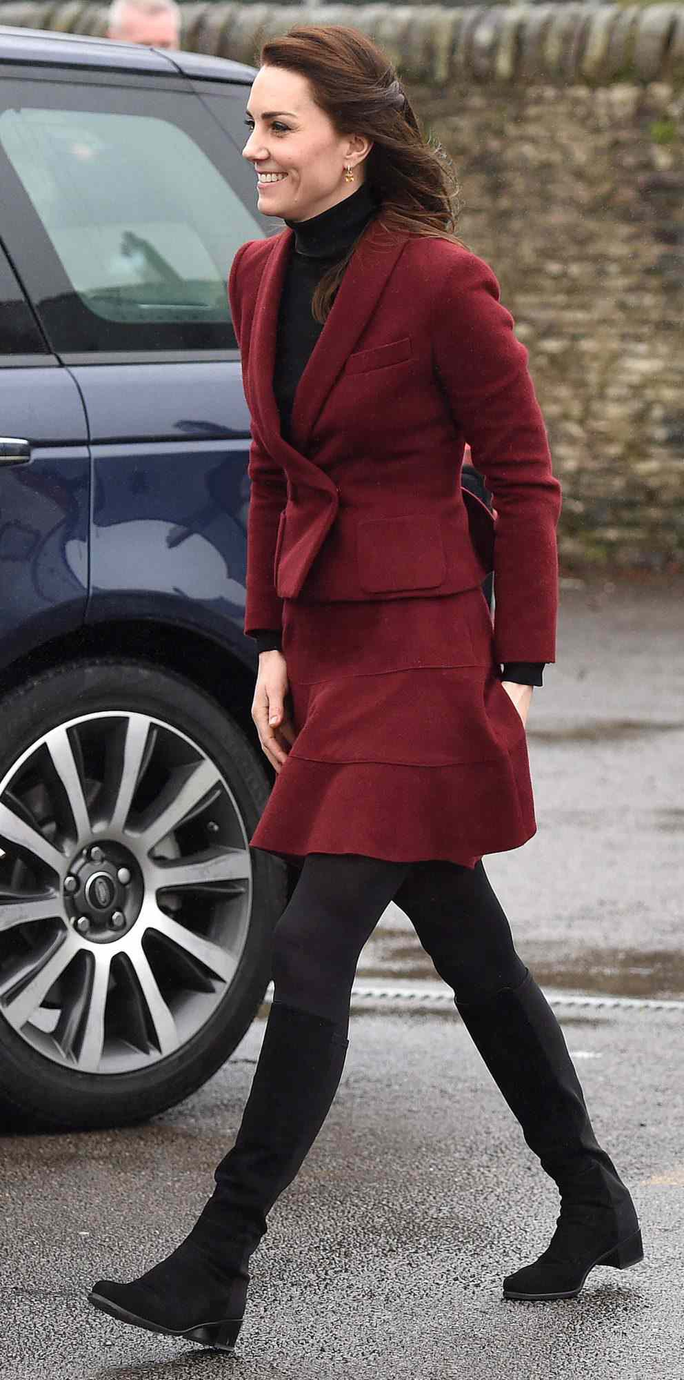 Kate Middleton in a burgundy Paule Ka skirt suit