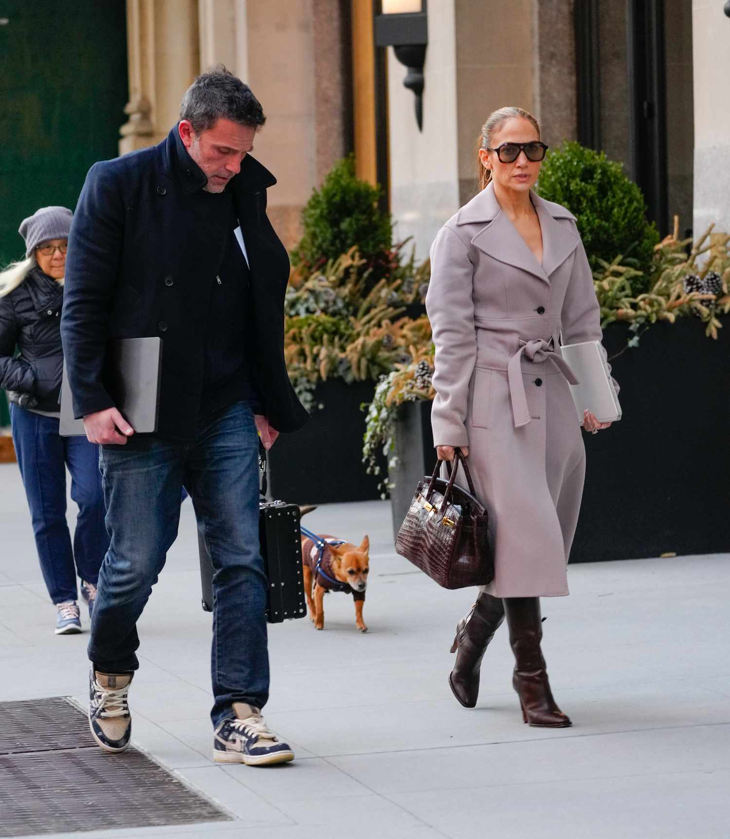 Ben Affleck Holding Laptop Walking Next to Jennifer Lopez Holding Birkin Bag on March 29, 2024 in New York City