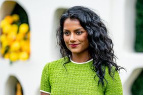 Simone Ashley showing off her long curly hair.