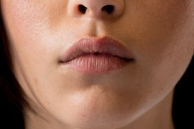 A closeup of a model's lips.