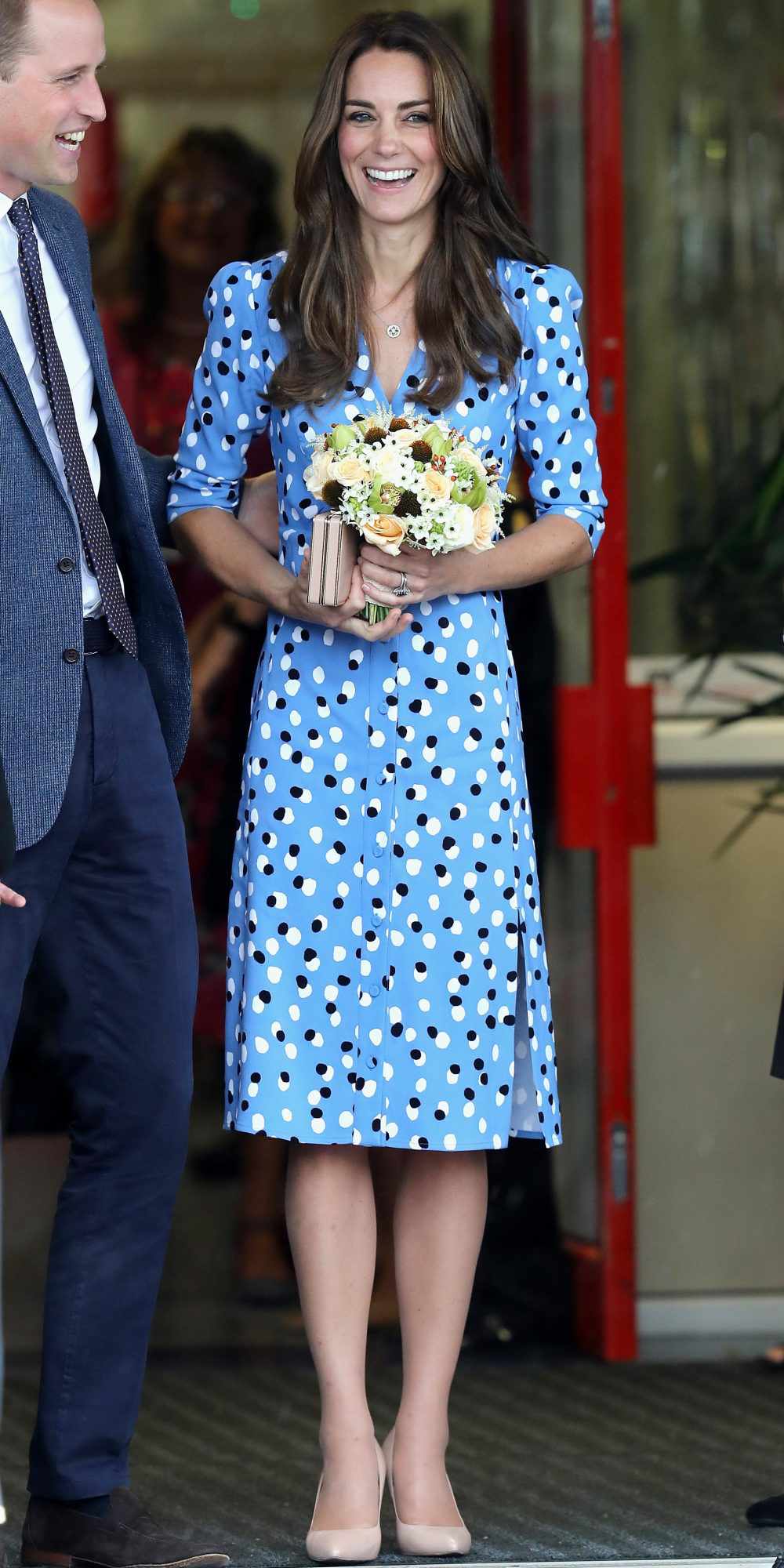 Kate Middleton in a blue polka-dot dress and nude pumps