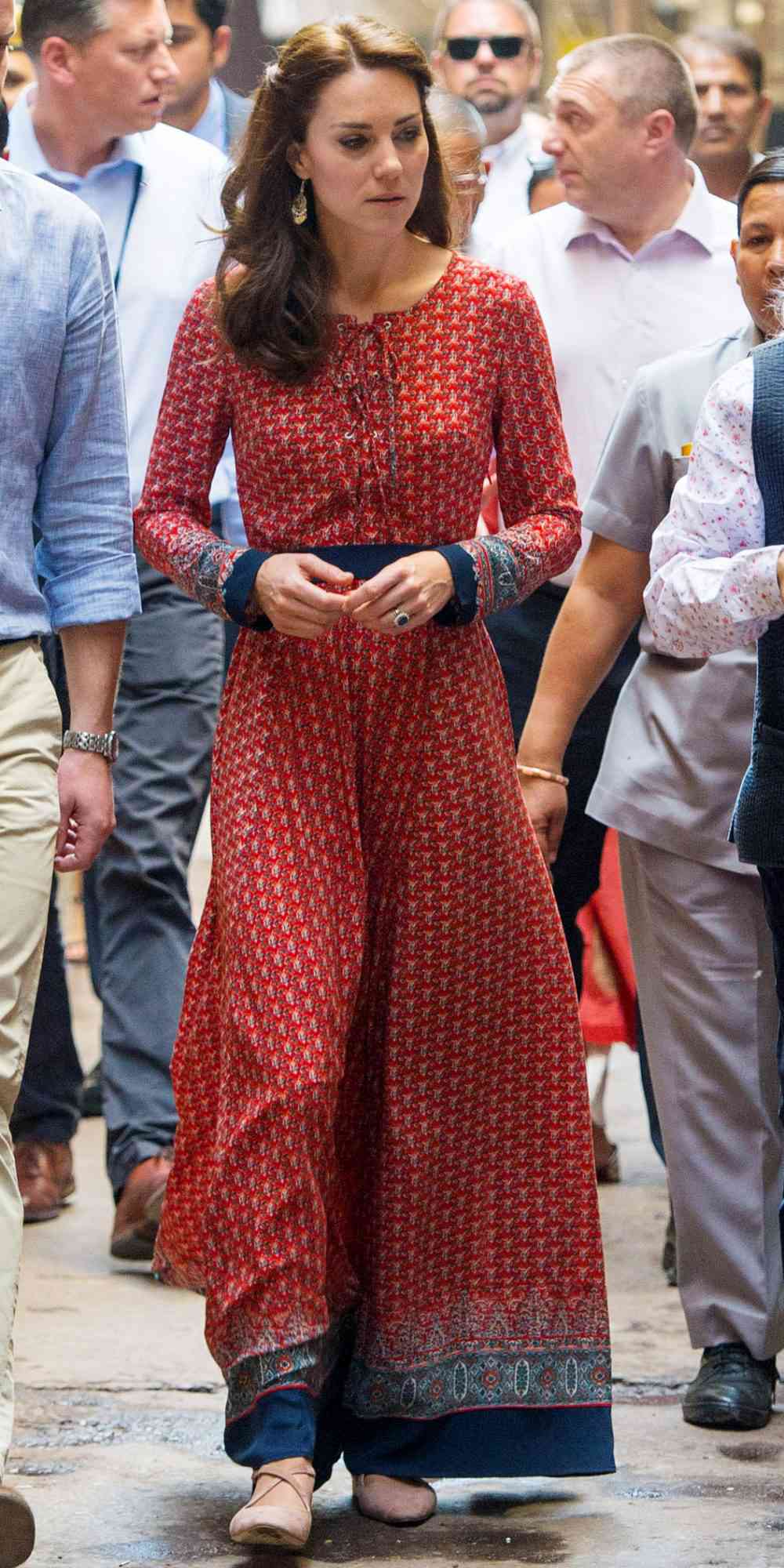 Kate Middleton in a printed red maxi dress and nude ballet flats