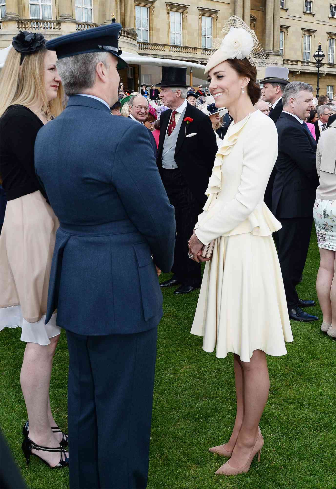 Kate Middleton in a cream Alexander McQueen skirt suit
