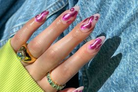 Pink 3D chrome leo nail art.