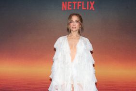 Jennifer Lopez Plunging White Ruffled Gown Straight Face Posing at 'Atlas' Event in Mexico City 2024