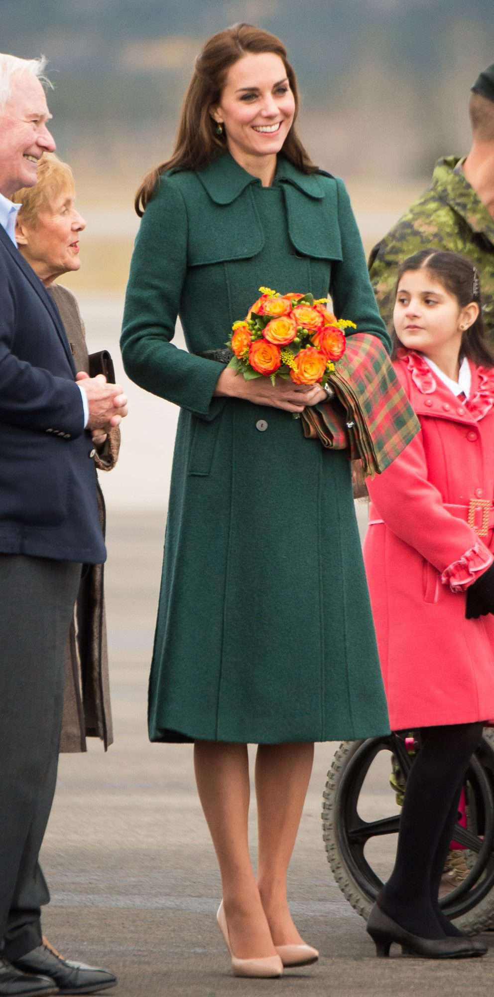 Kate Middleton in a tailored emerald green Hobbs coat