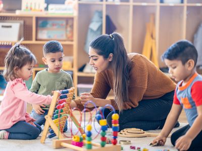 A teacher with children