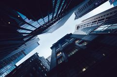 Contemporary financial skyscrapers from ground view against sky