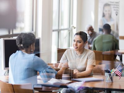 Banking customer speaks with representative about CDs